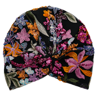 Multicolor sequin floral black turban worn as statement headwear for special occasions and hair loss or sensitive scalp